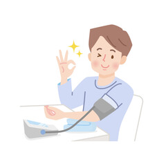 血圧を測る若い男性