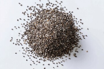 A collection of chia seeds, a superfood, neatly arranged on a bright white backdrop.