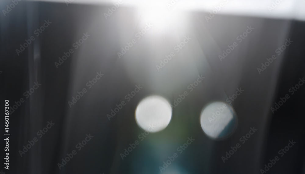 Aufkleber abstract light glare with blurred bokeh and lens flare on dark background for modern web design, branding visuals, or digital print texture graphic

