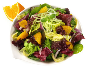 Fresh Mixed Salad with Orange isolated on white Background
