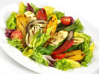 Fresh Grilled Vegetables with Mixed Salad isolated on white Background