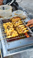 Grilled Seafood Skewers on Barbecue Grill Street Vendor