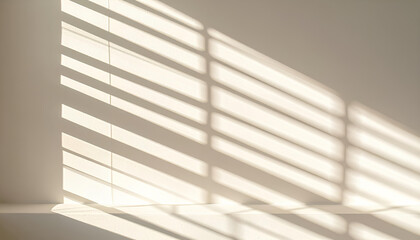 Minimalist shadow pattern of sunlight through blinds on white wall in natural warm lighting
