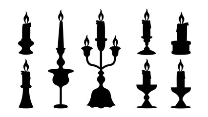 set of black silhouettes of candles