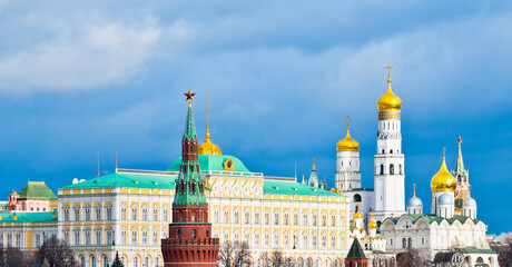 Moscow Kremlin view in winter day. Black clouds and sun light. Moscow. Russia
