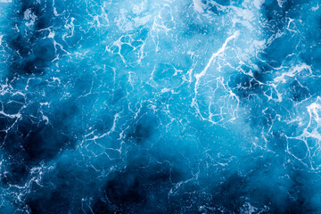 Ocean surface texture. Top view of amazing water with foam. Can be used in covers, packaging, posters, textures, brochures, art, and design projects. Creative nature background image.
