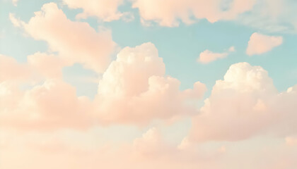 Soft Pastel Clouds Against A Light Blue Sky At Sunrise With Gentle Pink Hues