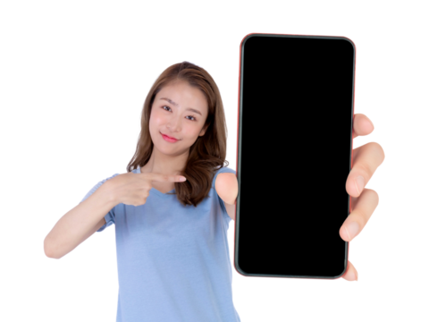 Young attractive Asian woman in blue shirt smiling and pointing at a big smartphone with blank black screen, isolated on a transparent background, promoting mobile app, digital content online service - Powered by Adobe