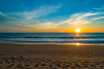 Aerial view sunset sky,Nature beautiful light sunset or sunrise over sea surface,Colorful sunset sky with clouds and waves in the ocean,Wide angle sea background