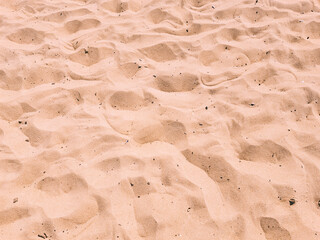 Yellow Sand of a Seashore with Footprints