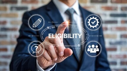 Businessperson's finger selecting eligibility concept.