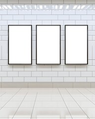 Three blank posters on a white tiled wall