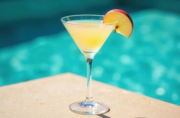 Refreshing apple martini by the poolside on a sunny day