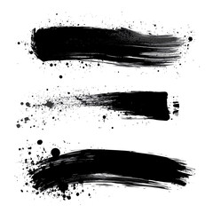 Naklejka premium Set of three different black ink or paint strokes on transparent background. grunge style. abstract strokes, marks, spots and splashes. design element. chaotic strokes