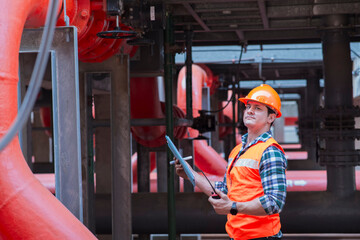 Engineer under checking the industry cooling tower air conditioner is water cooling tower air...
