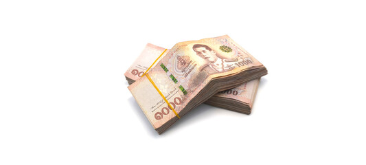 1.000 baht banknotes stacked on a white background. Finance and currency concept. Exchange rate.