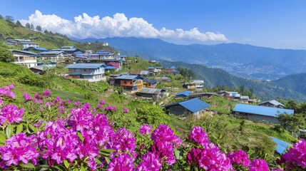 Scenic view of mountainous village with colorful houses surrounded by vibrant flowers and lush greenery under clear blue sky