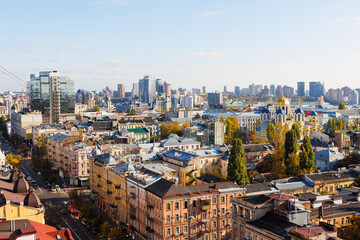 Elevated view of the Kyiv cityscape, prominently featuring the historic St Volodymyr's Cathedral