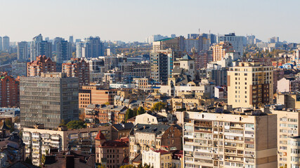 Panoramic high-angle view of the Kyiv city skyline, Ukraine, on a clear sunny day.