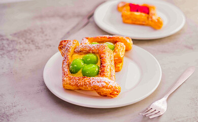 Delicious Square Danish Pastries with Green Grapes