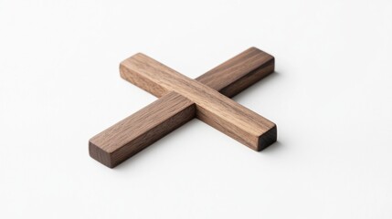 Modern minimalist wooden cross with clean lines on white background.