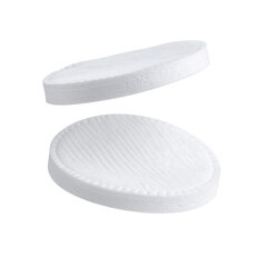 Two white cotton pads floating on transparent background
