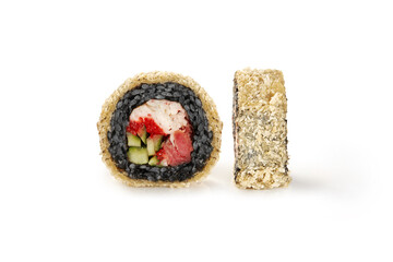Tempura hot roll showing black rice, cucumber, surimi crab and tuna filling on white background