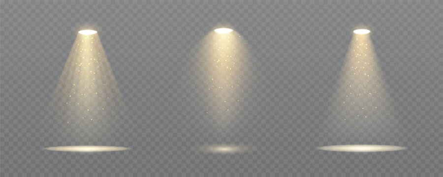 Realistic spotlight set with gold glowing dust particles on transparent png background and reflection on the floor for stage, studio, or theater light effects. 