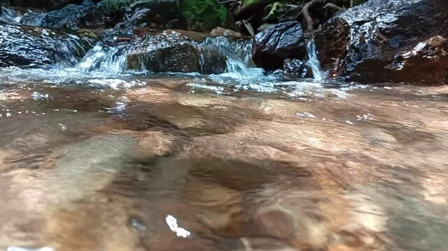 water flowing into a stream