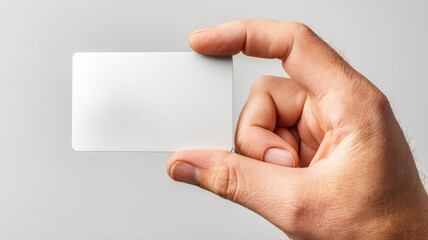 Obraz premium Blank business card in hand — a detailed and modern 3D-style concept ideal for tech visuals, infographics, marketing materials, and futuristic digital presentations.