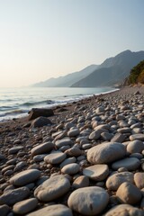Pebble Beach Seascape with Mountain Backdrop