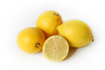 Group of fresh yellow lemons isolated on a white background
