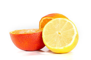 Assorted citrus fruits including lemons, oranges, and limes isolated on a white background, vibrant and fresh