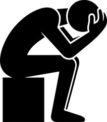 Person crouching with head down, appearing sad or depressed
