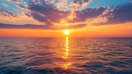 Obraz premium Vibrant Sunset Over Calm Ocean Water
