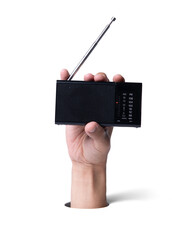 Male hand with retro black radio breaks through white paper background.