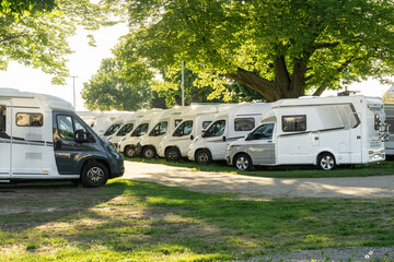 Camper van dealership lot – a sales area with various motorhomes and camper vans on display
