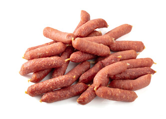 Small dry-cured sausages isolated on white.