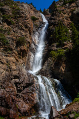 Obraz premium Burhan-bulak Falls is the tallest waterfall in Kazakhstan. It is located in the Kora River gorge in the Jongar Alatau mountains.
