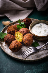 Middle Eastern falafel balls with sauce