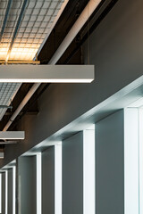 Modern Industrial Ceiling Design with Sleek Lighting and Abstract Architecture