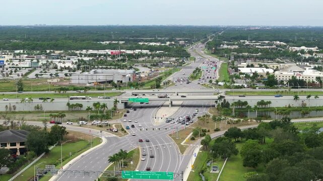 Freeway diverging diamond junction with fast moving traffic cars in Sarasota, Florida. Interstate transportation infrastructure in USA.