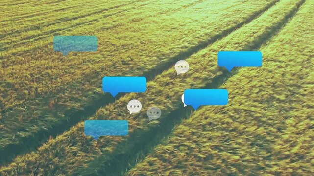 Digital speech bubbles floating above golden wheat field, showing messaging concept in flat style