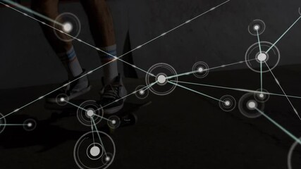 Skateboarder sliding down concrete ramp while digital tech network overlay connecting data nodes - Powered by Adobe