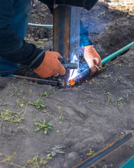 A man doing welding work. Selective focus.