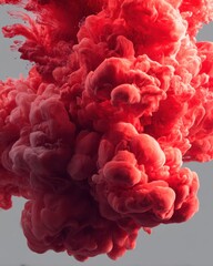 Obraz premium Crimson ink cloud in water abstract dynamic flow artistic concept ethereal movement underwater explosion red color splash creative background