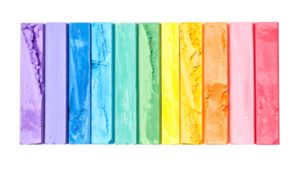Colorful chalk pastels forming a rainbow gradient on transparent background