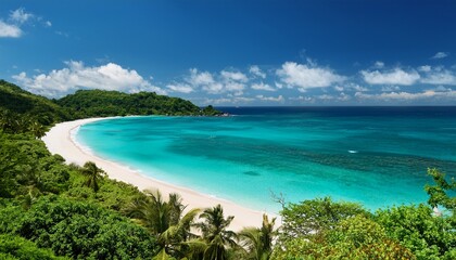 Fototapeta premium scenic tropical coastline with turquoise water white sand beach and lush green vegetation
