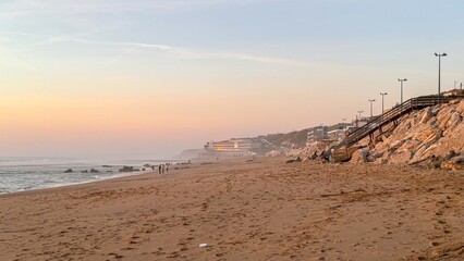 Golden dune expanse as sunset whispers, coastal daydream, serene horizon, evokes La Tomatina...