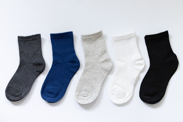 5 Pairs of Baby Socks Blue, Black, Grey, White on White Background